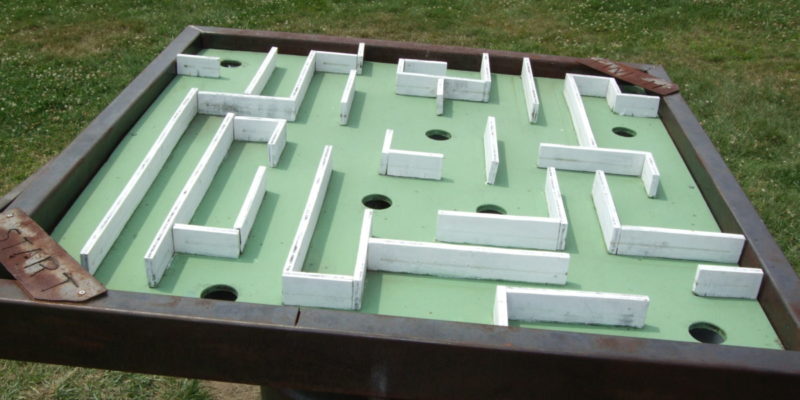 Player scan solve some sort of maze (like the classic Labyrinth game) in order to get a key or object.